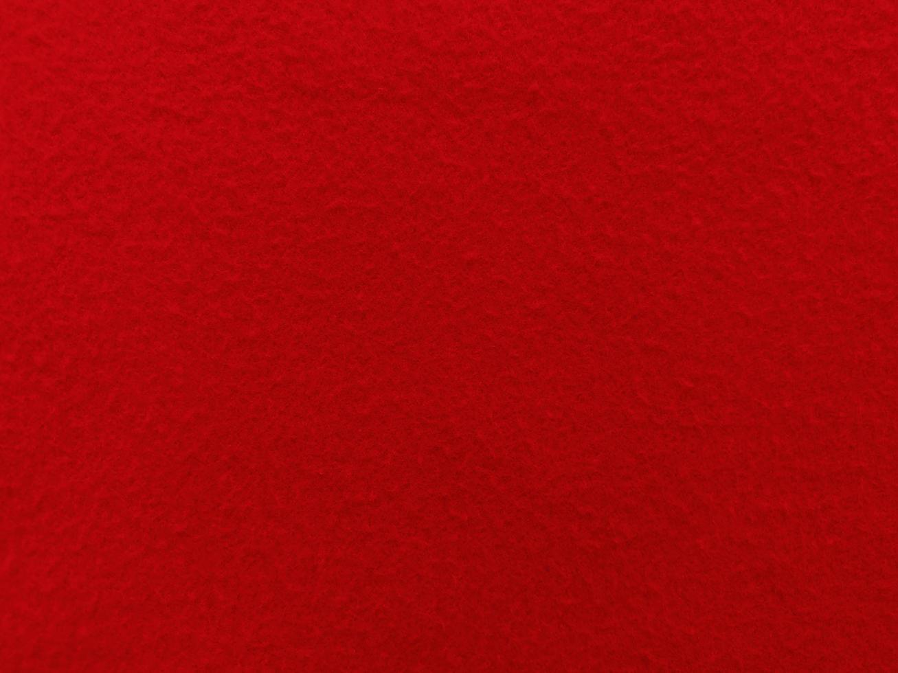 Felt red soft rough textile material background texture close up,poker table,tennis ball,table cloth. Empty red fabric background. photo