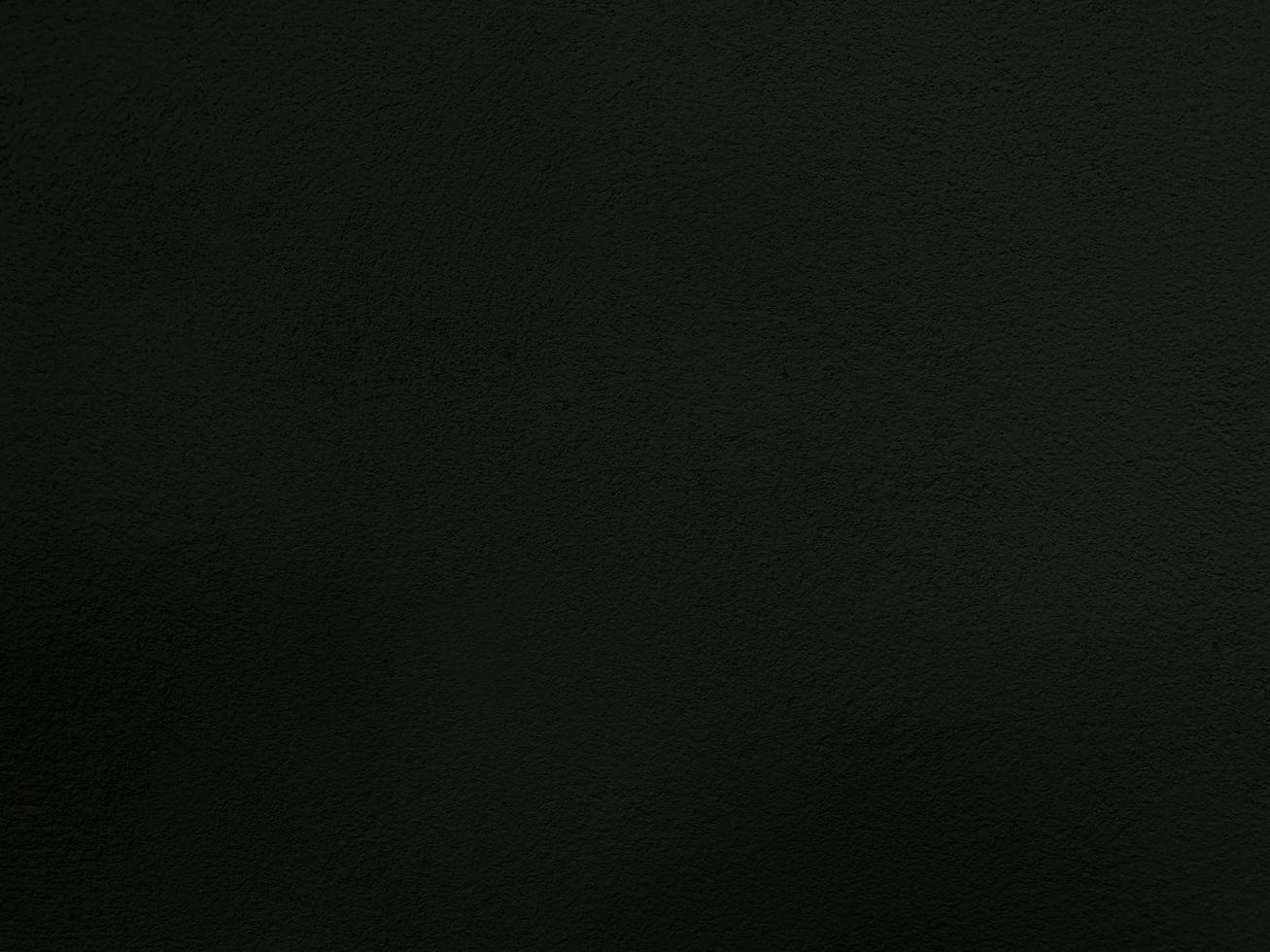 Seamless texture of black cement wall a rough surface, with space for text, for a background. photo