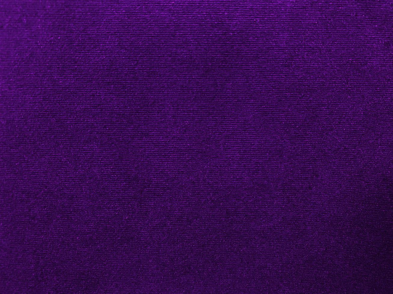 Purple velvet fabric texture used as background. Empty purple fabric background of soft and smooth textile material. There is space for text. photo