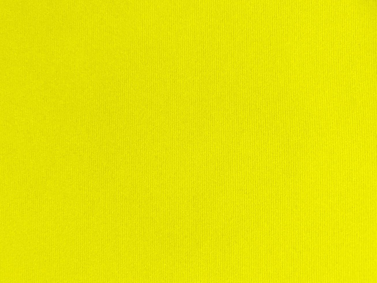 Yellow velvet fabric texture used as background. Empty yellow fabric background of soft and smooth textile material. There is space for text. photo