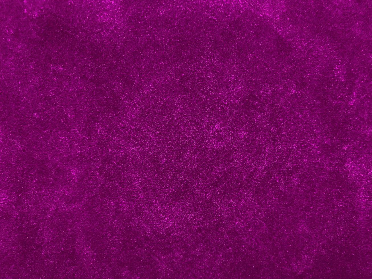Purple velvet fabric texture used as background. Empty purple fabric background of soft and smooth textile material. There is space for text. photo