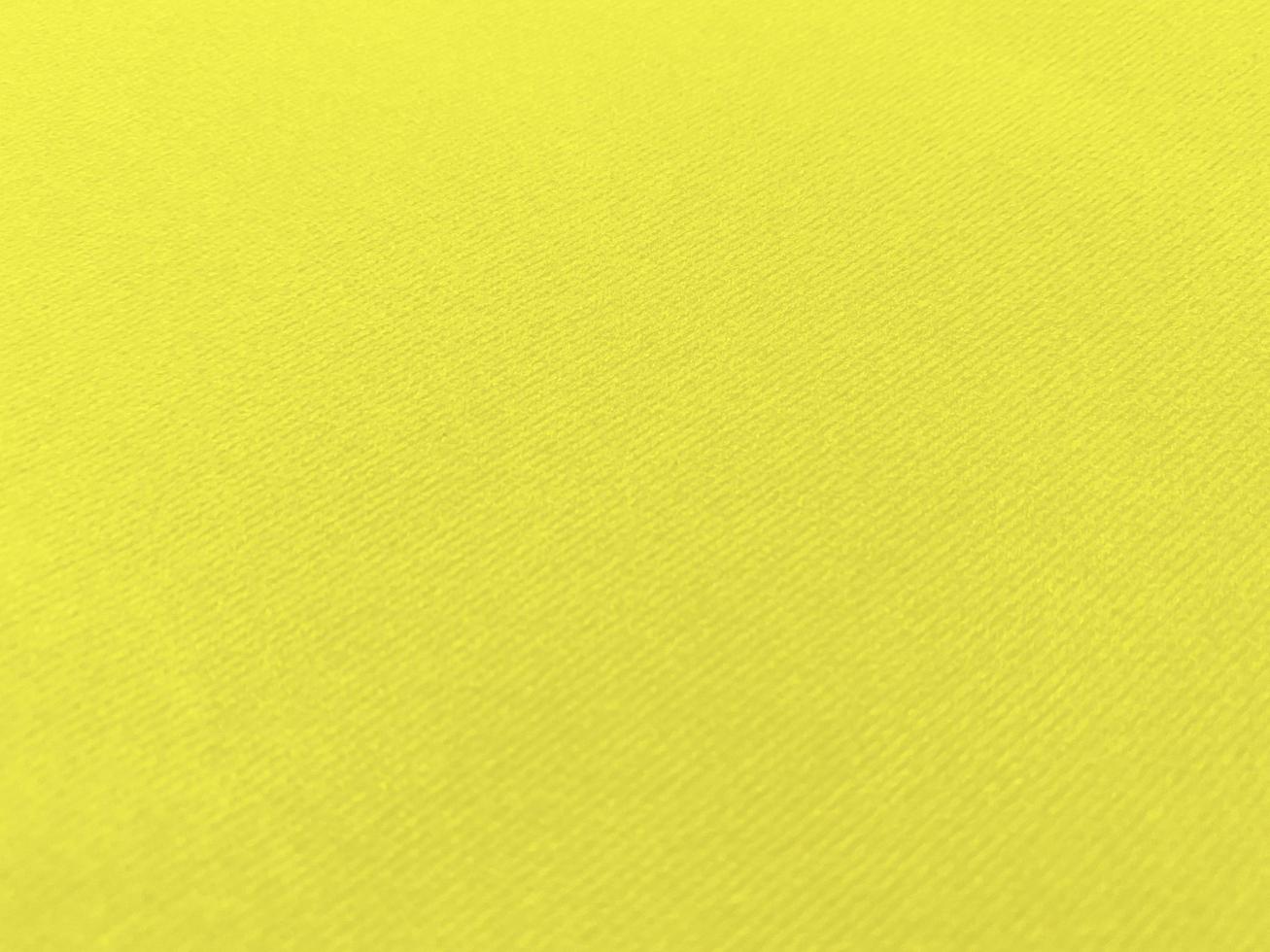 Yellow velvet fabric texture used as background. Empty yellow fabric background of soft and smooth textile material. There is space for text. photo