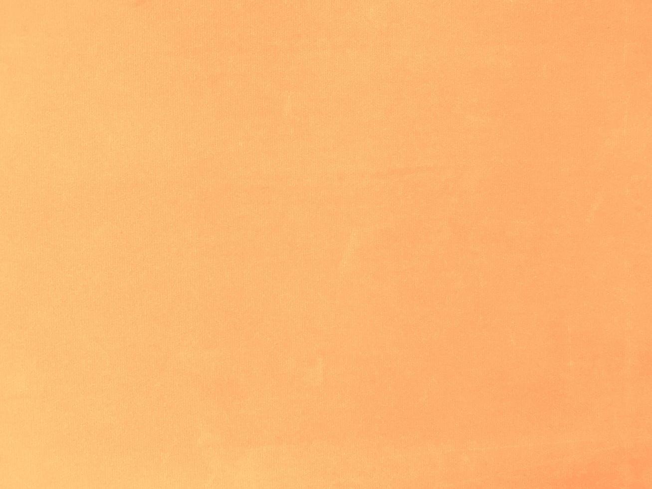 Orange velvet fabric texture used as background. Empty orange fabric background of soft and smooth textile material. There is space for text. photo