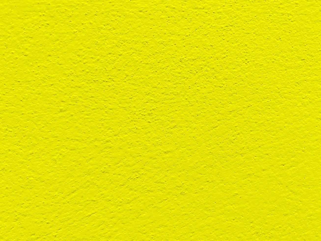 textura transparente de pared de cemento amarillo una superficie rugosa, con espacio para texto, para un fondo. foto