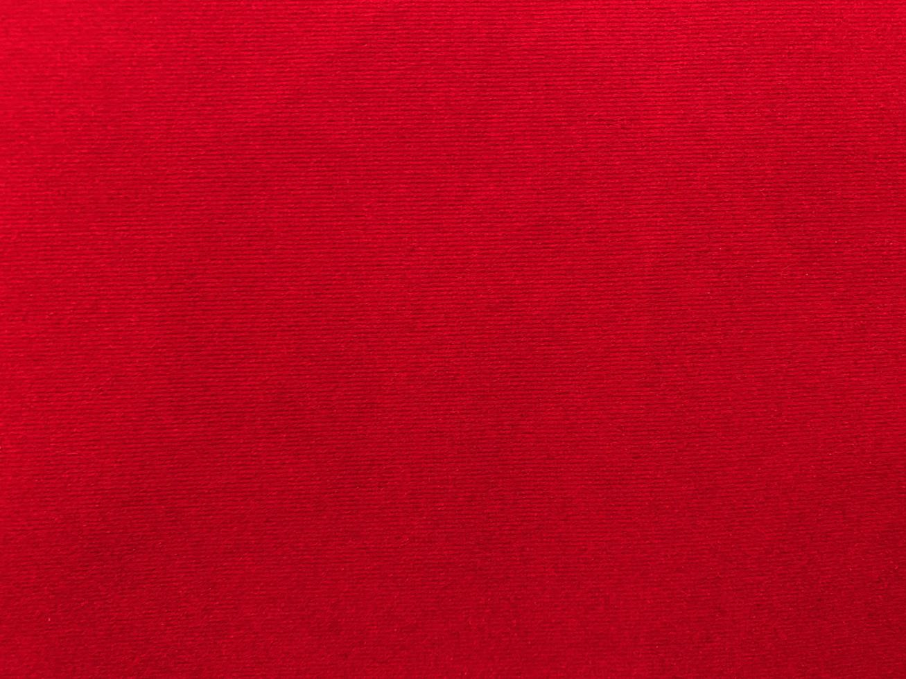 Red velvet fabric texture used as background. Empty red fabric background of soft and smooth textile material. There is space for text. photo