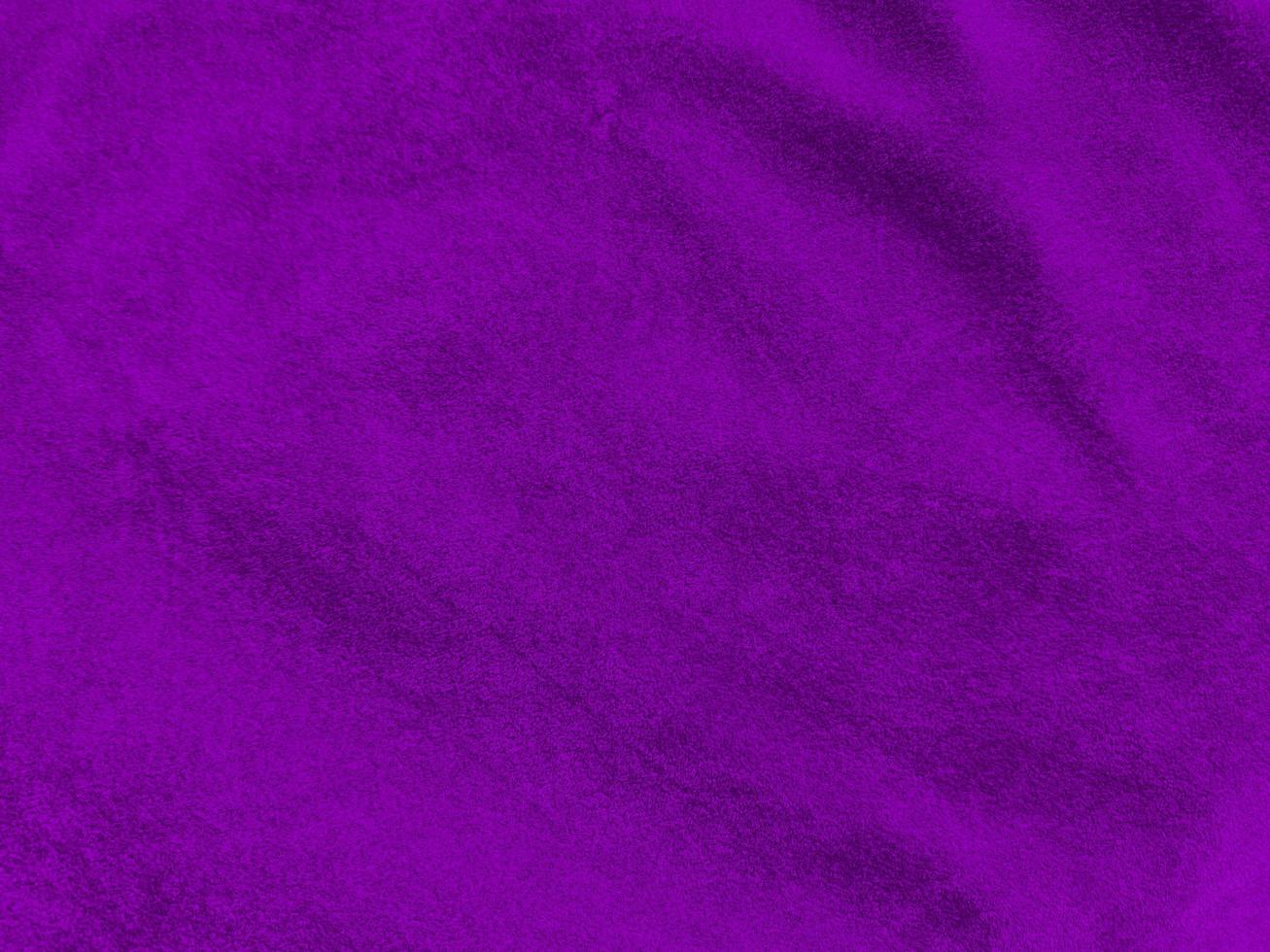 Purple velvet fabric texture used as background. Empty purple fabric background of soft and smooth textile material. There is space for text. photo