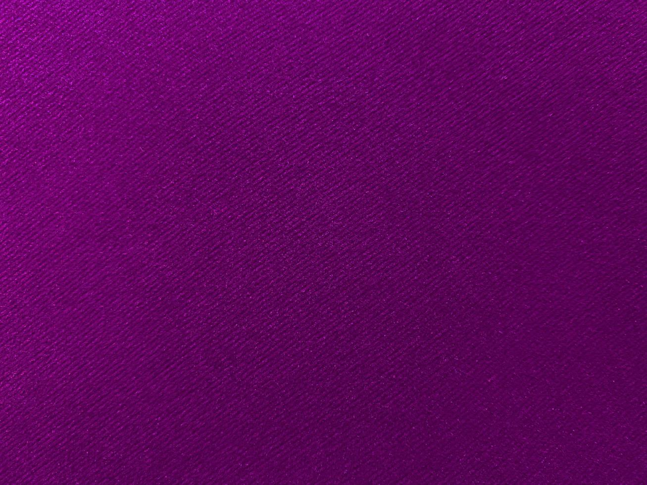Purple velvet fabric texture used as background. Empty purple fabric background of soft and smooth textile material. There is space for text.. photo