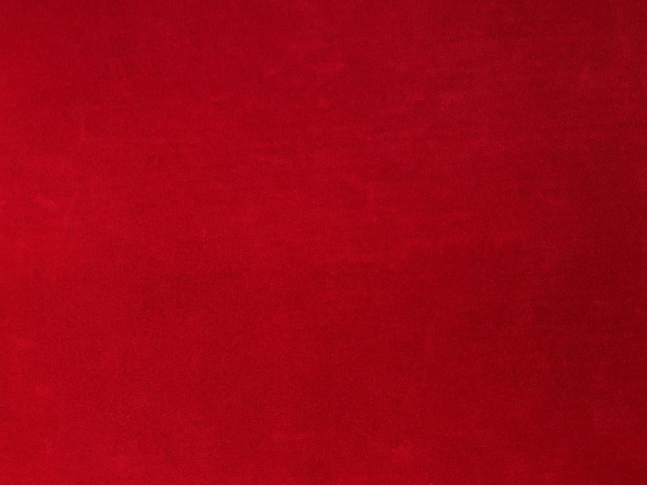 Red old velvet fabric texture used as background. Empty red fabric background of soft and smooth textile material. There is space for text. photo