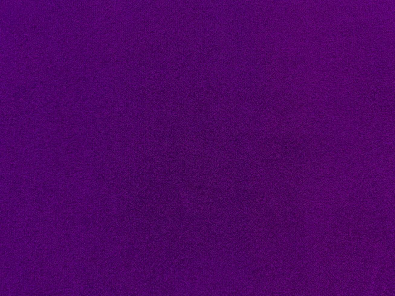 Purple velvet fabric texture used as background. Empty purple fabric background of soft and smooth textile material. There is space for text. photo