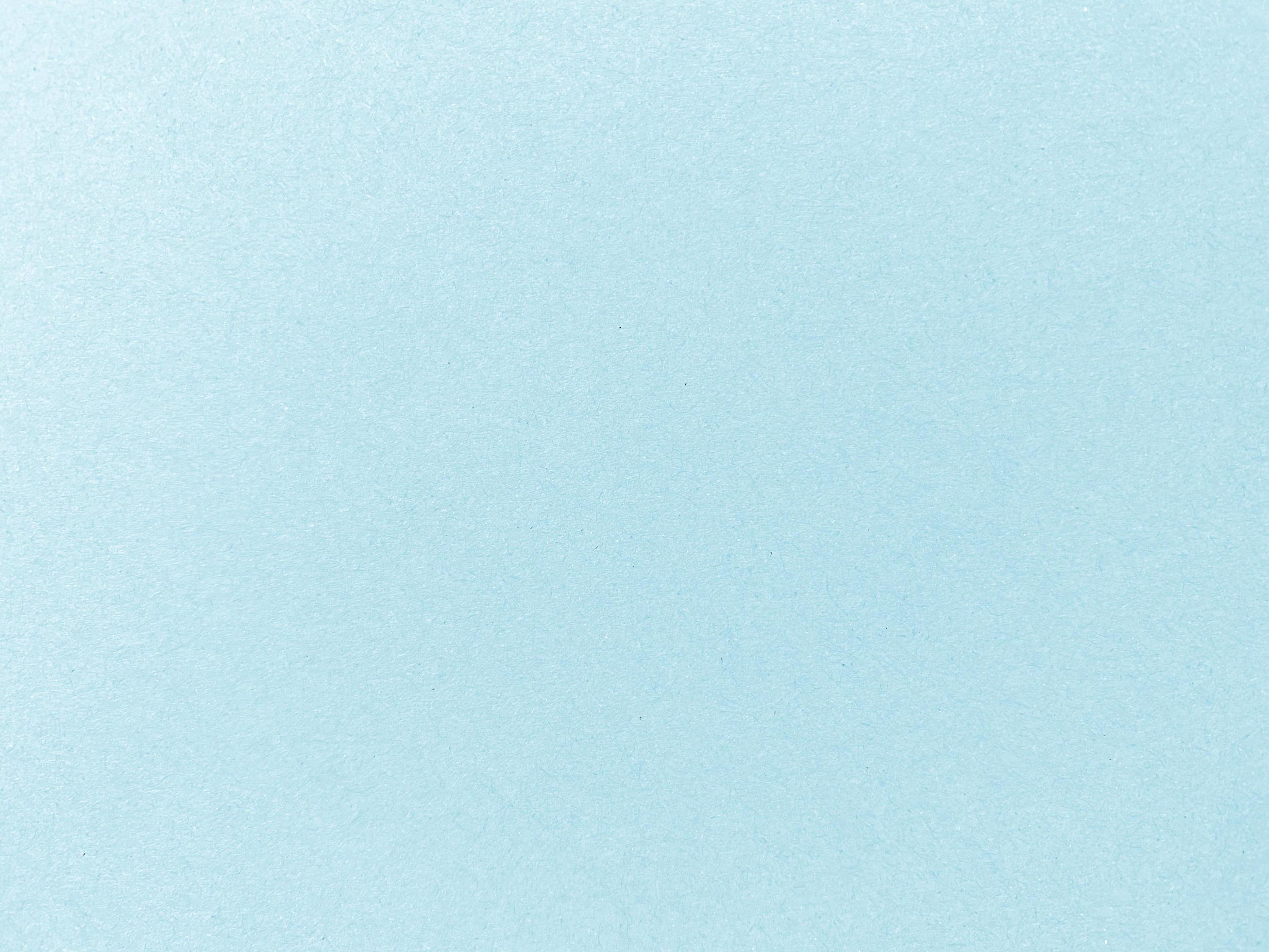 Light blue paper texture cardboard, suitable for a background. used for vintage wallpapers and