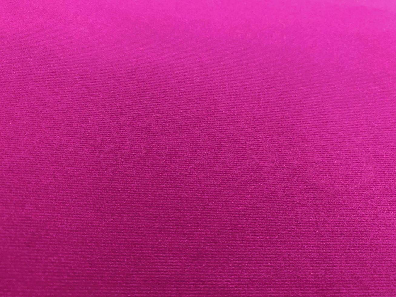 Pink velvet fabric texture used as background. Empty pink fabric background of soft and smooth textile material. There is space for text. photo