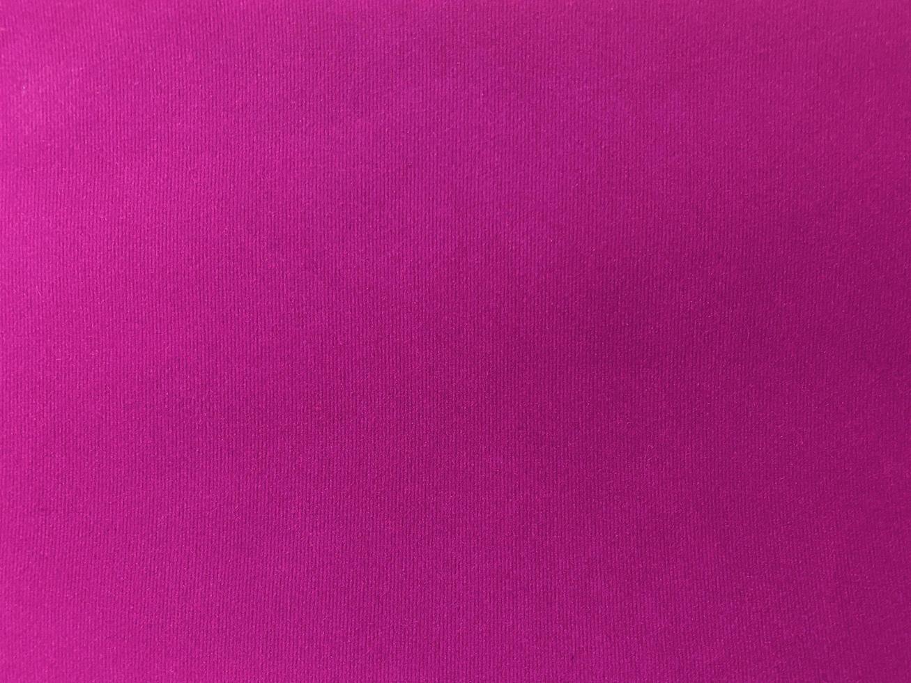 Pink velvet fabric texture used as background. Empty pink fabric background of soft and smooth textile material. There is space for text. photo