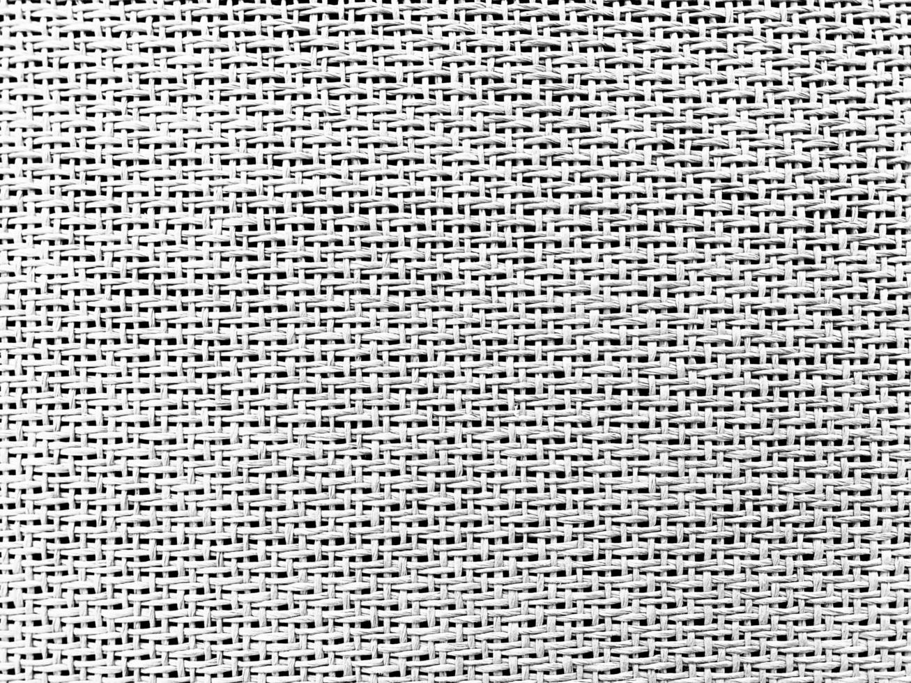 Close up white The  is woven into a net. natura rope texture as a background. Full frame of tightly woven rope pattern.with space for text, for a background. photo
