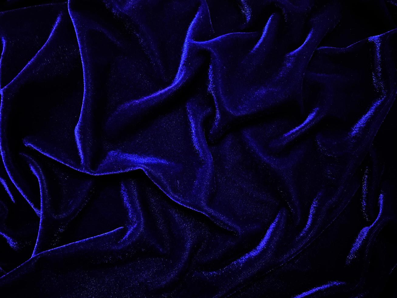 Blue velvet fabric texture used as background. Empty blue fabric background of soft and smooth textile material. There is space for text. photo