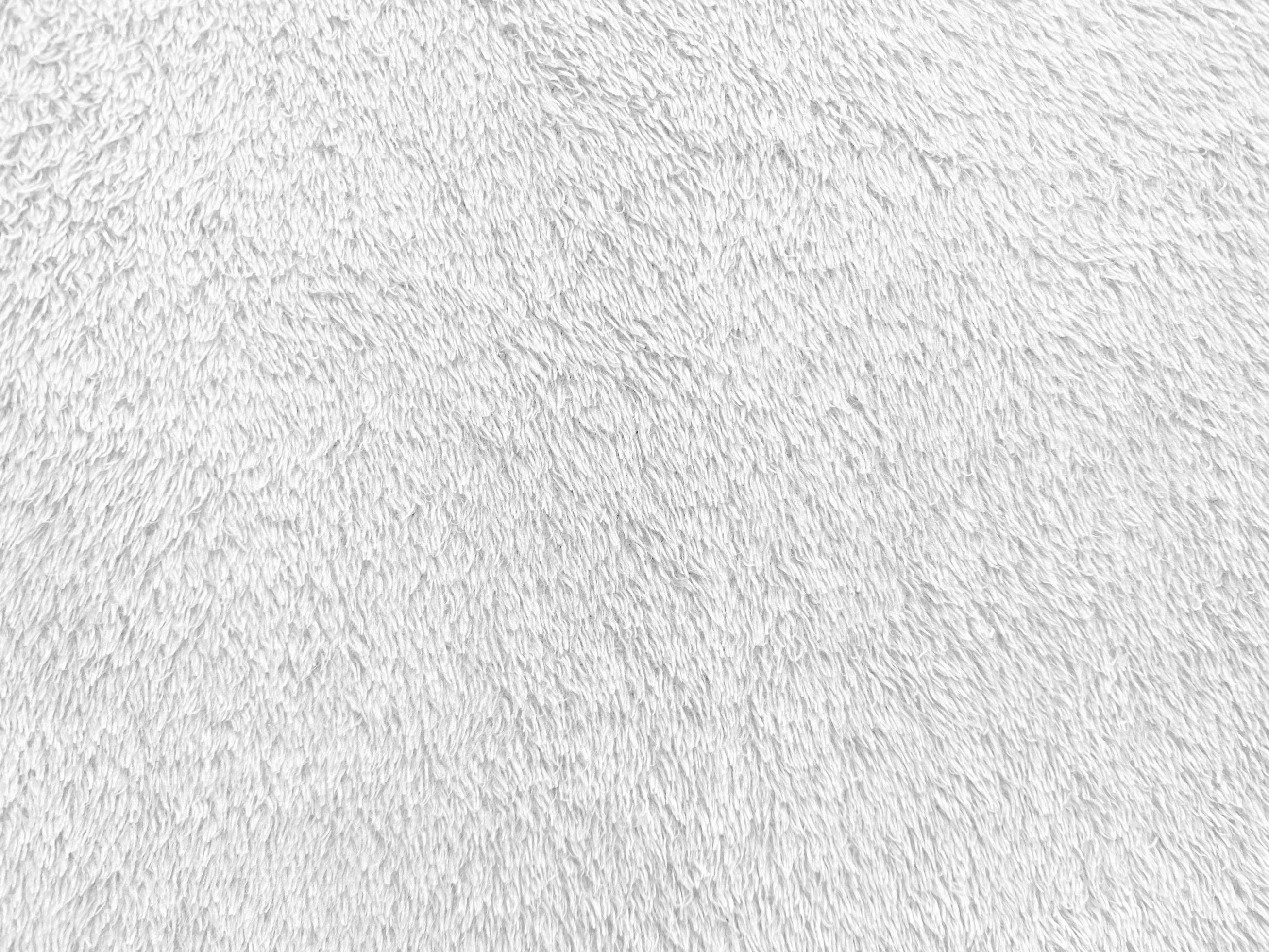 White clean wool texture background. light natural sheep wool. white