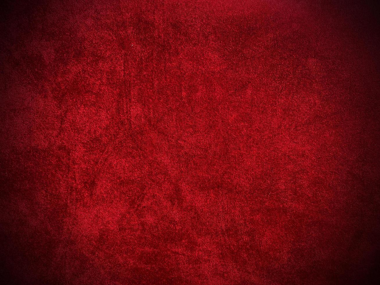 Dark red velvet fabric texture used as background. Empty dark red fabric background of soft and smooth textile material. There is space for text.. photo