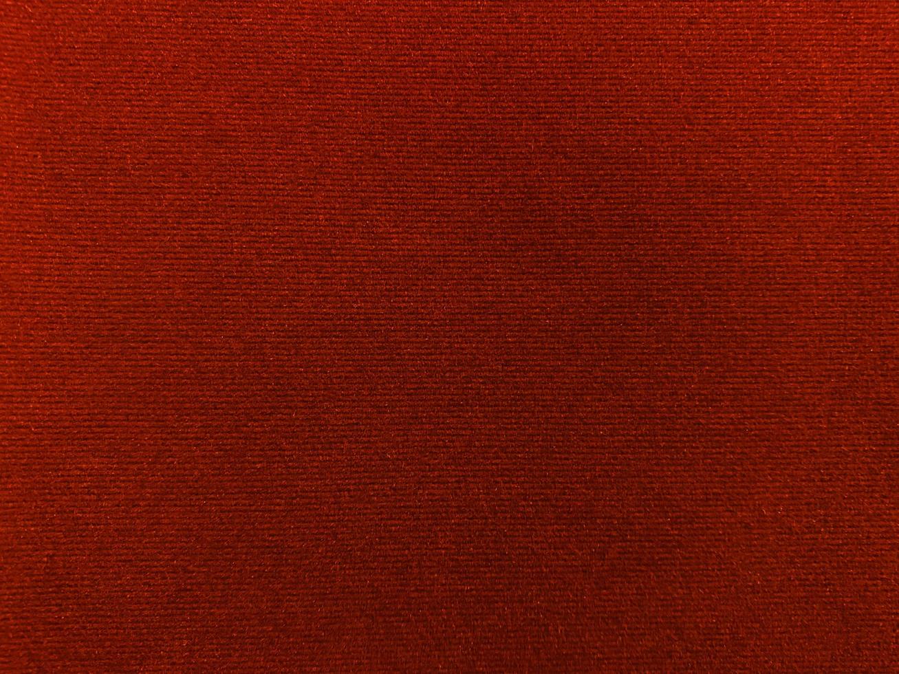 Dark red velvet fabric texture used as background. Empty red fabric background of soft and smooth textile material. There is space for text.. photo