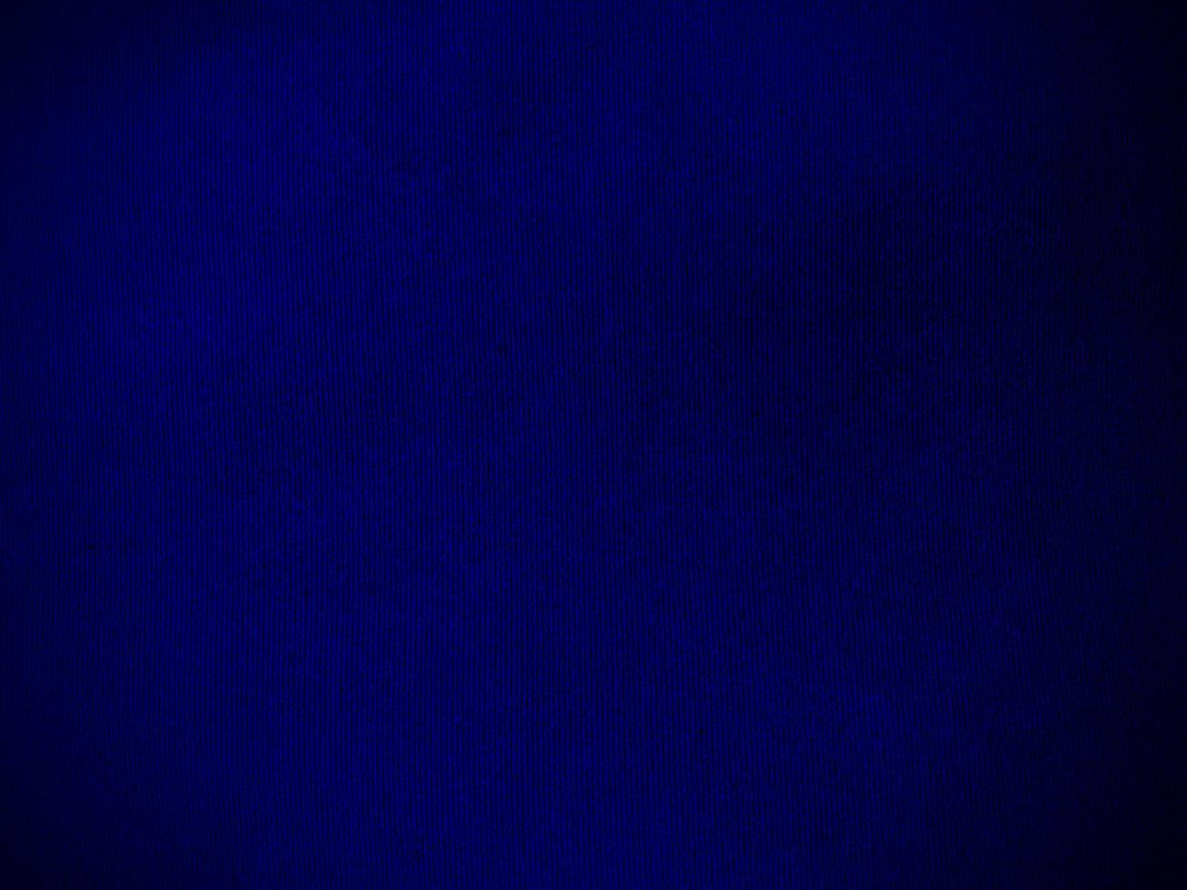 Blue velvet fabric texture used as background. Empty blue fabric background of soft and smooth textile material. There is space for text. photo