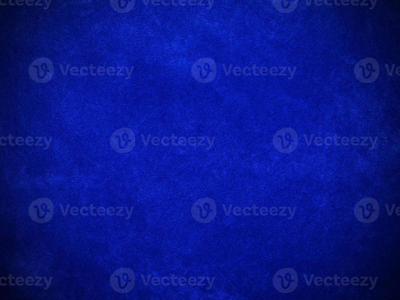 Blue velvet fabric texture used as background. Empty blue fabric background of soft and smooth textile material. There is space for text. photo