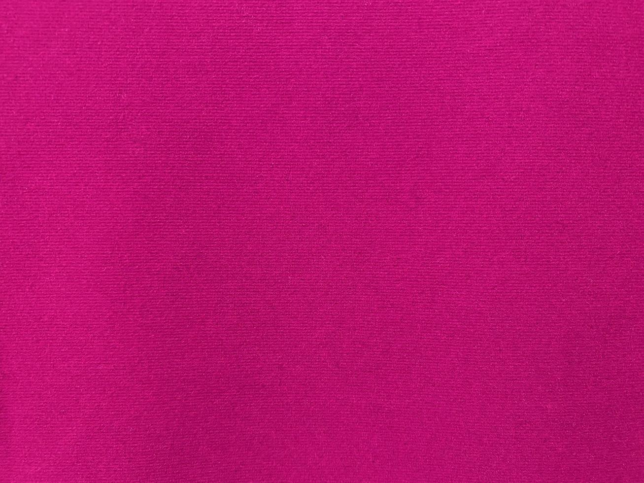 Pink velvet fabric texture used as background. Empty pink fabric background of soft and smooth textile material. There is space for text. photo