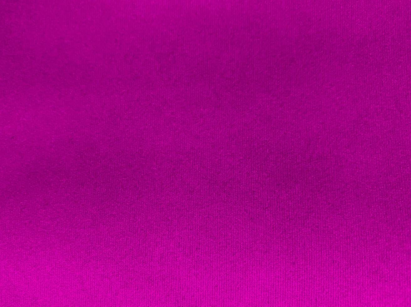 Pink velvet fabric texture used as background. Empty pink fabric background of soft and smooth textile material. There is space for text. photo