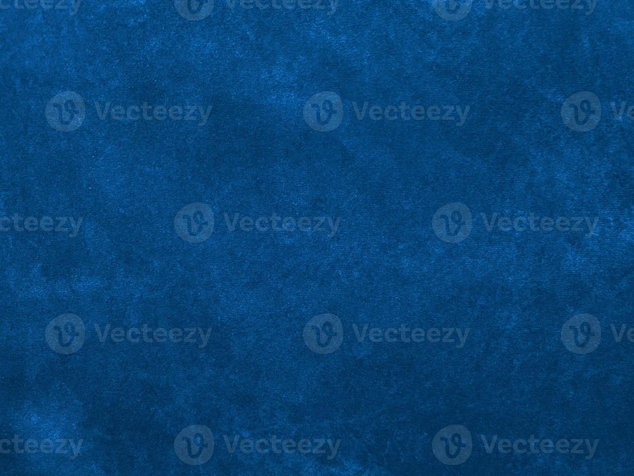 Dark blue velvet fabric texture used as background. Empty dark blue fabric background of soft and smooth textile material. There is space for text. photo