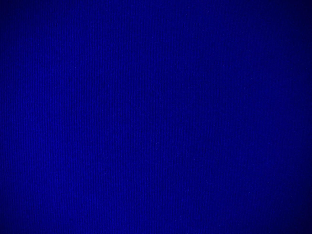 Dark blue velvet fabric texture used as background. Empty dark blue fabric background of soft and smooth textile material. There is space for text. photo
