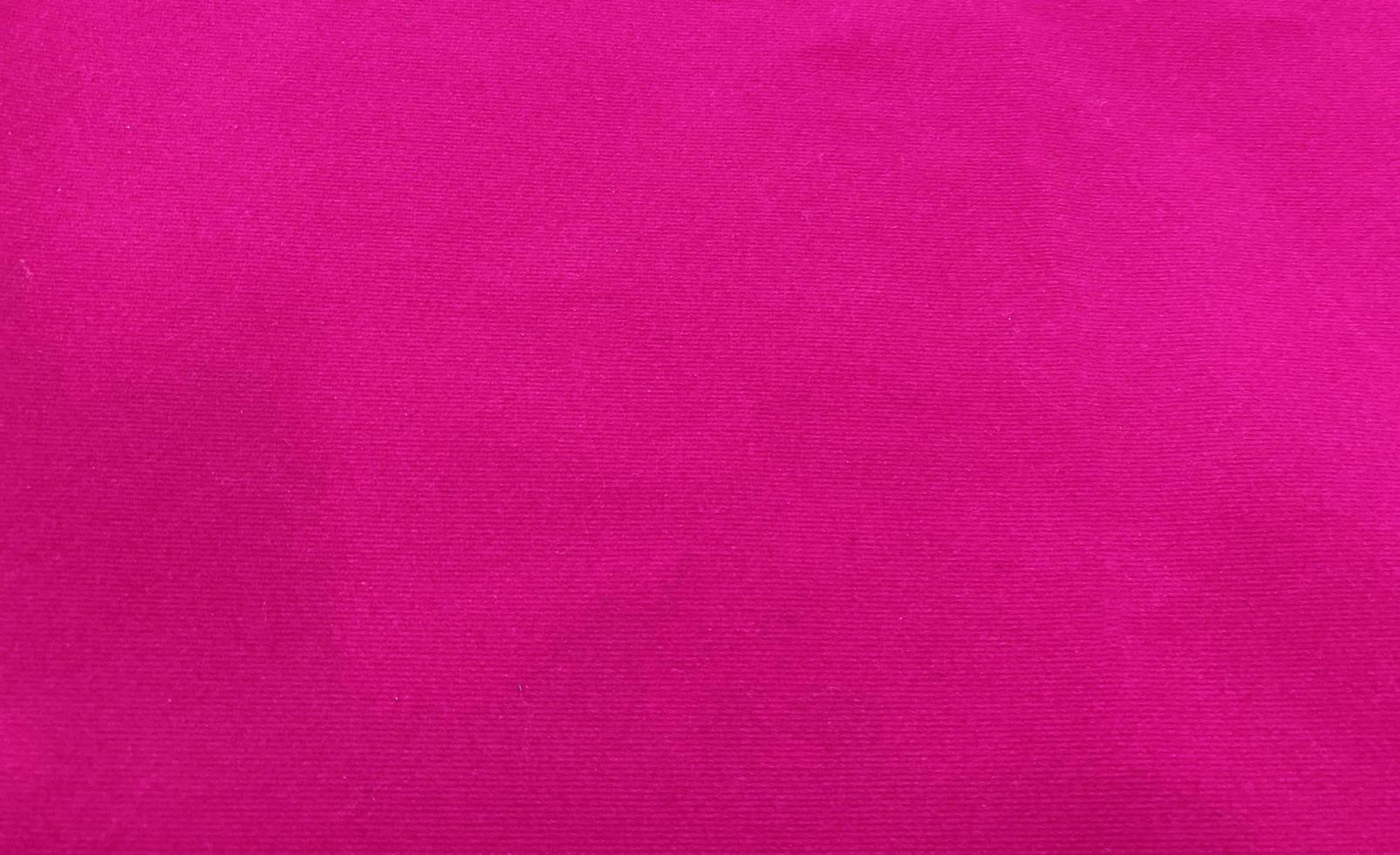 Pink velvet fabric texture used as background. Empty pink fabric background of soft and smooth textile material. There is space for text. photo