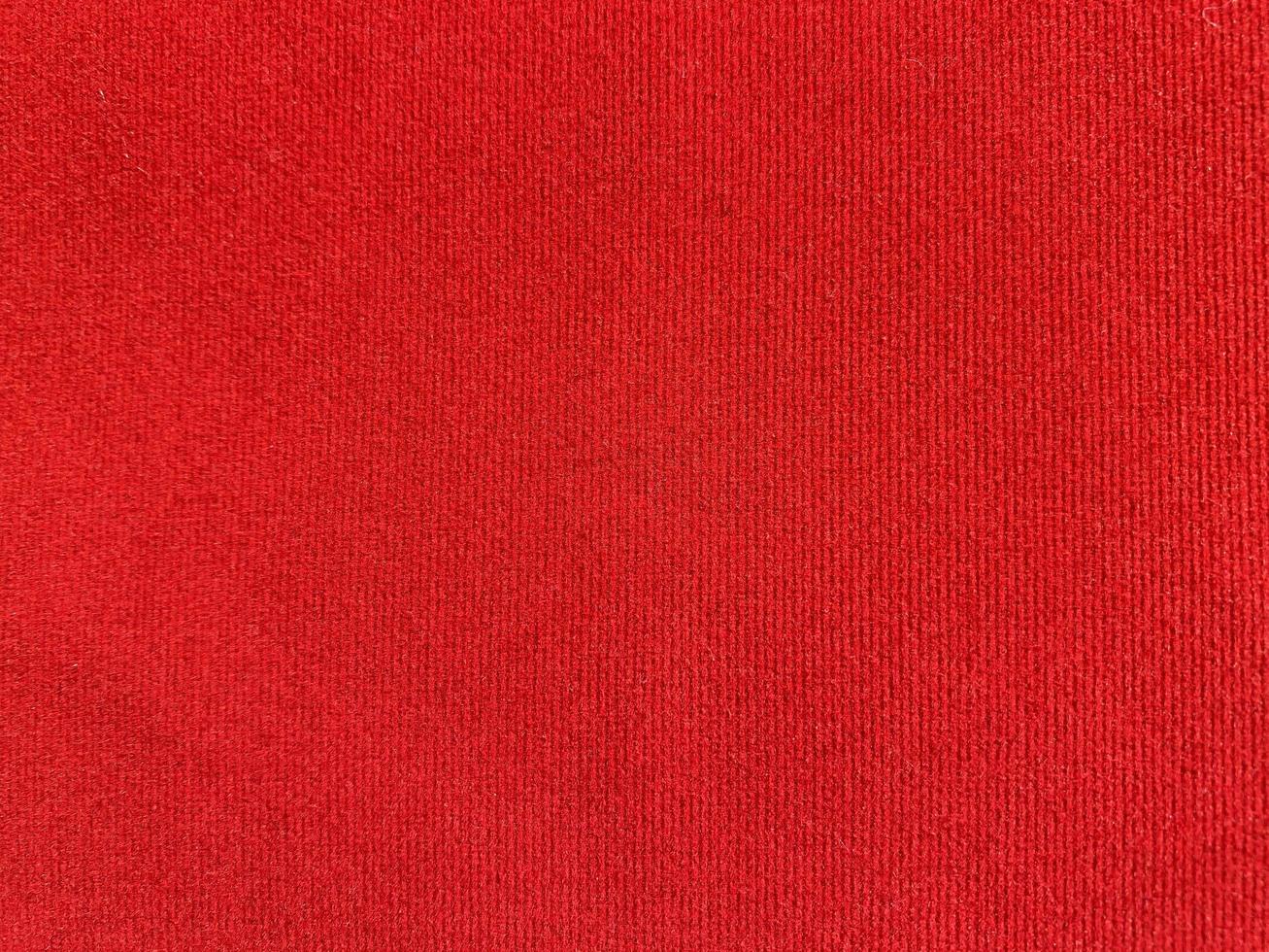 Red velvet fabric texture used as background. Empty red fabric background of soft and smooth textile material. There is space for text. photo