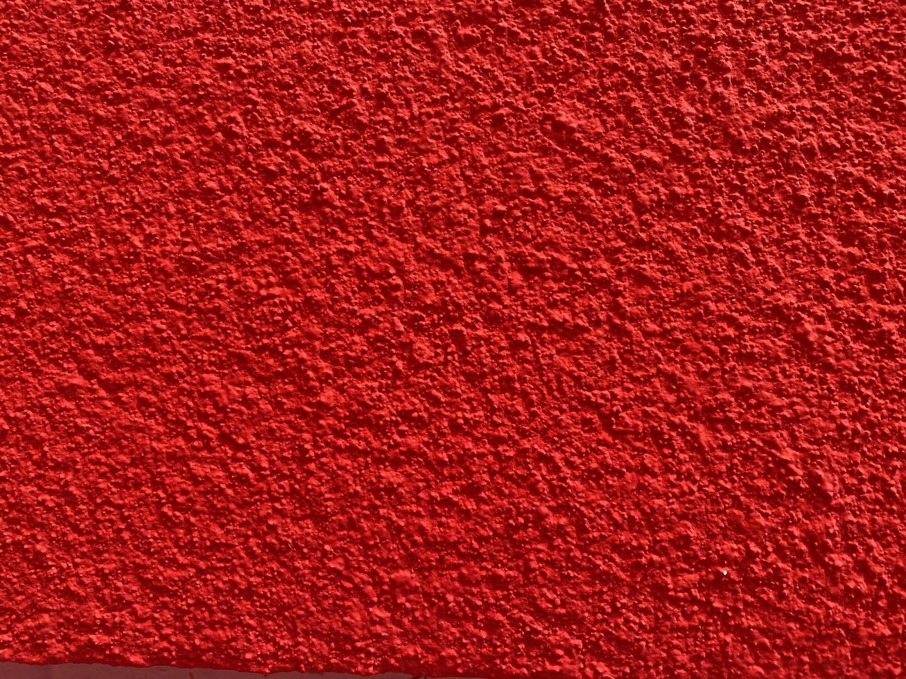 Seamless texture of red cement old wall a rough surface, with space for text, for a background. photo