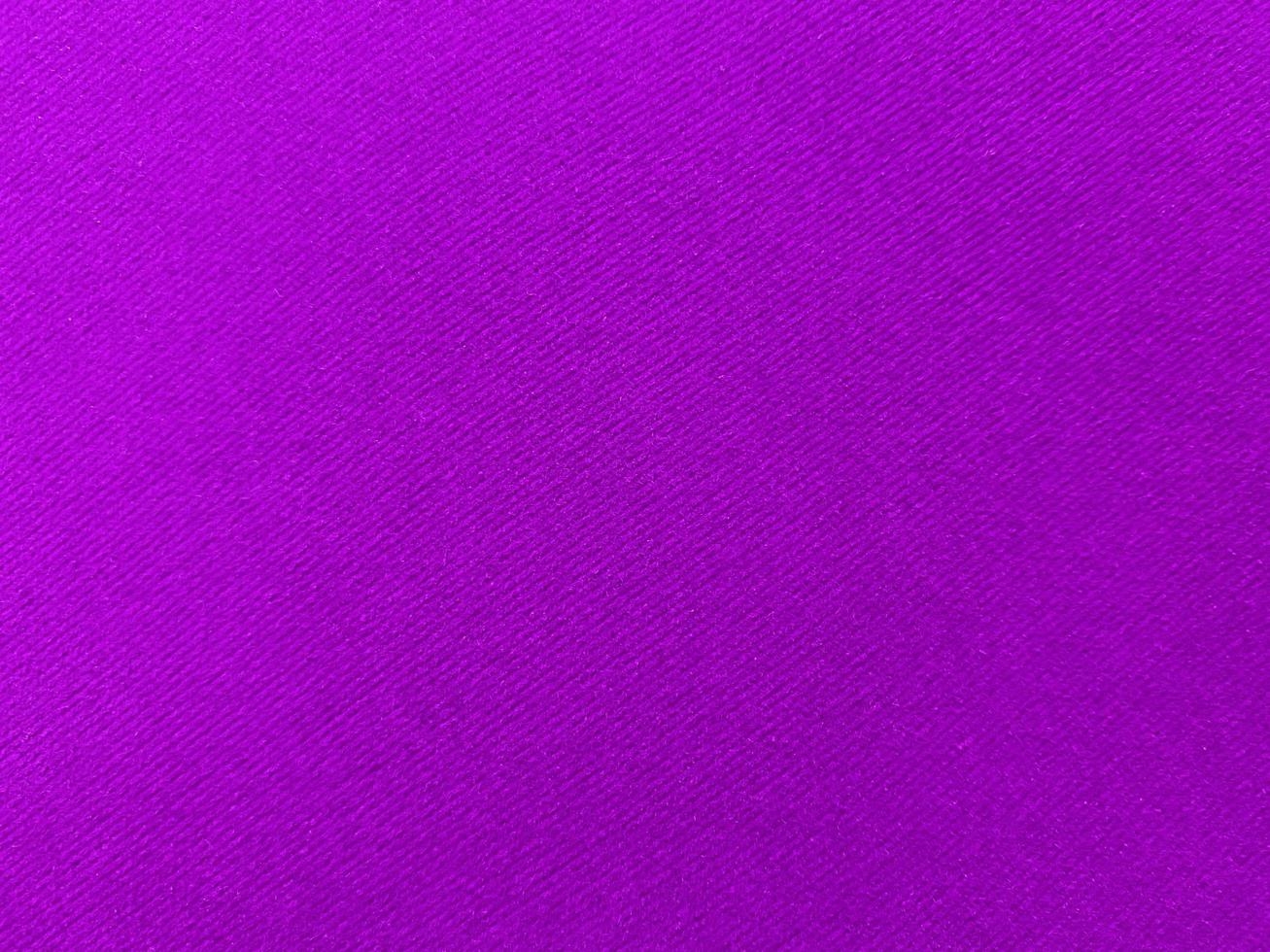 Dark purple old velvet fabric texture used as background. Empty purple fabric background of soft and smooth textile material. There is space for text.. photo