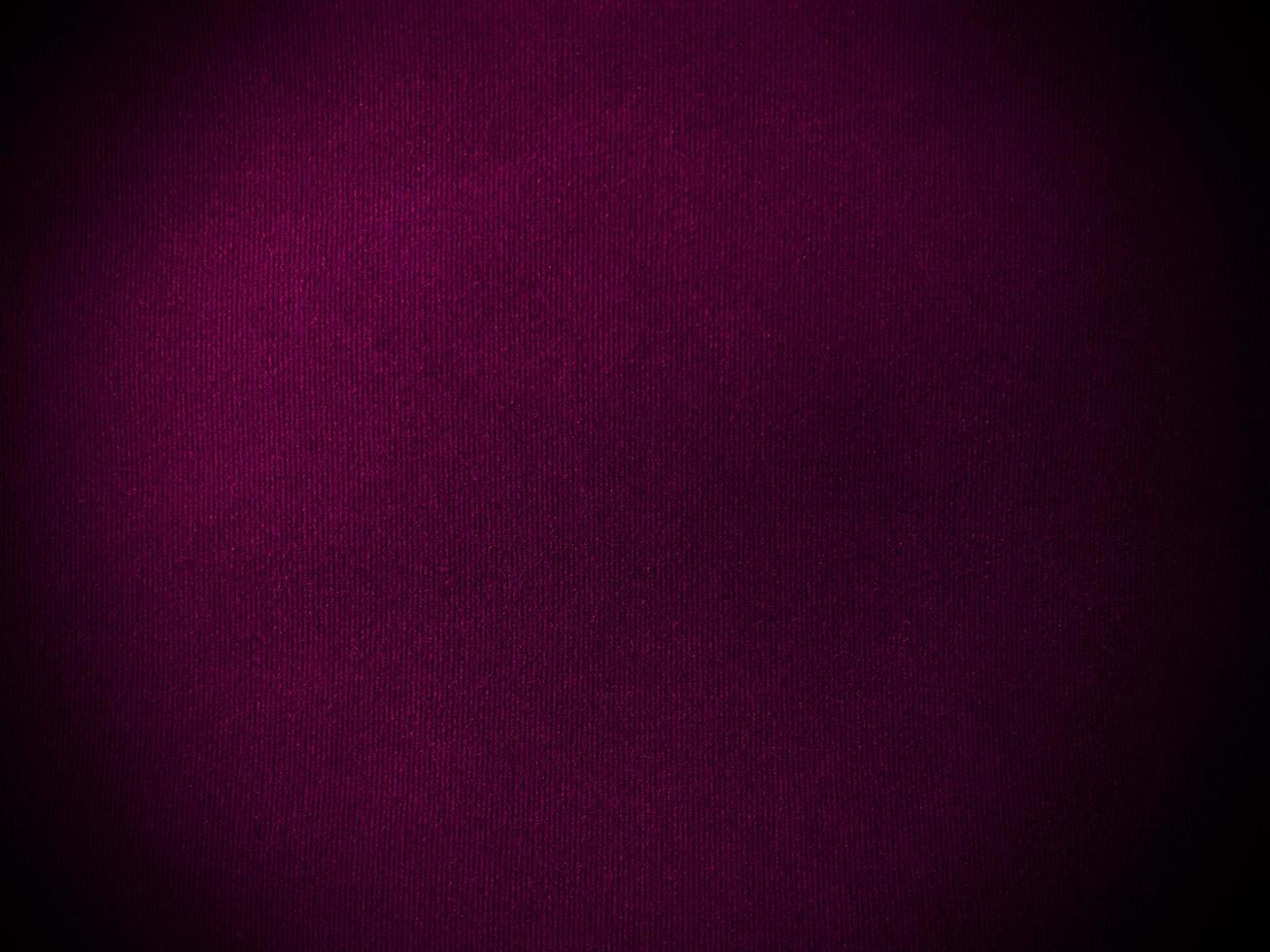 Dark magenta velvet fabric texture used as background. Empty magenta fabric background of soft and smooth textile material. There is space for text. photo
