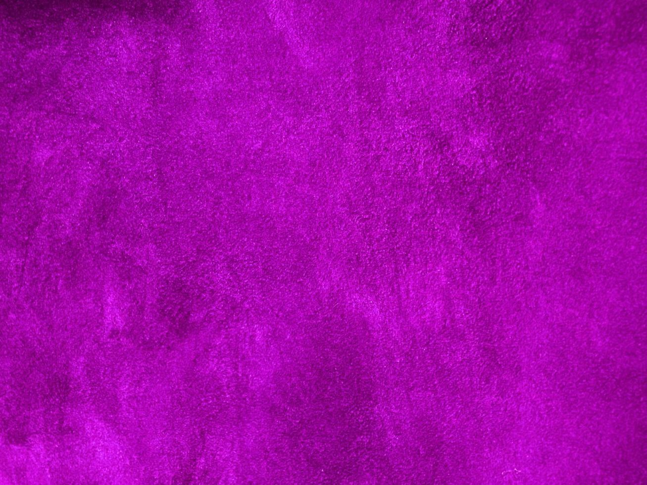 Dark purple old velvet fabric texture used as background. Empty purple fabric background of soft and smooth textile material. There is space for text. photo