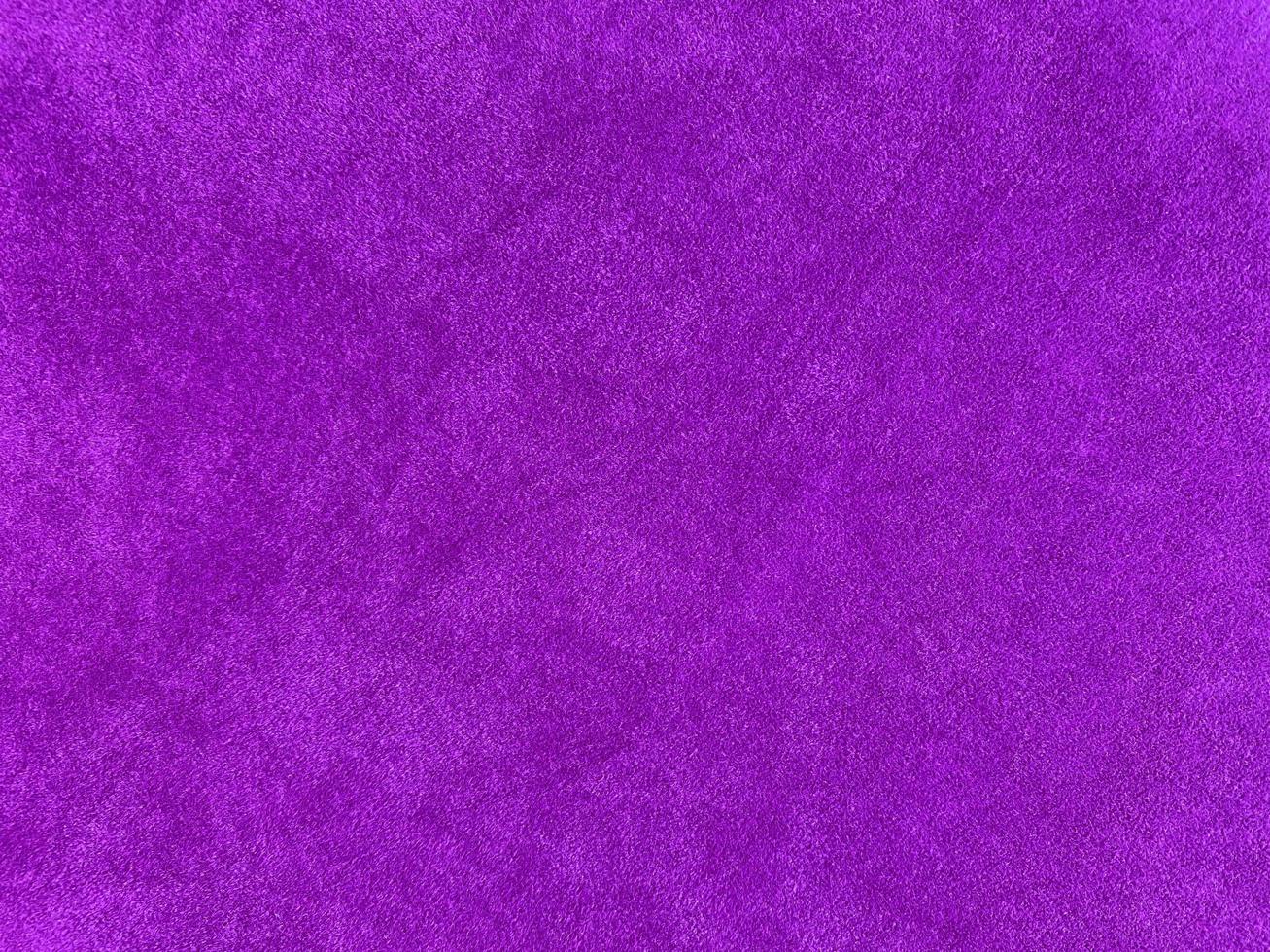 Purple velvet fabric texture used as background. Empty purple fabric background of soft and smooth textile material. There is space for text.. photo