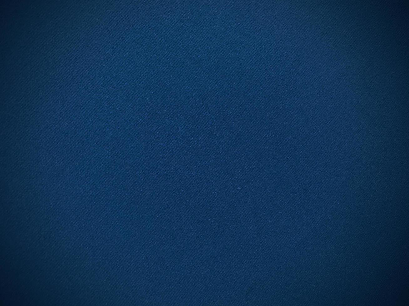Dark blue velvet fabric texture used as background. Empty dark blue fabric background of soft and smooth textile material. There is space for text.. photo