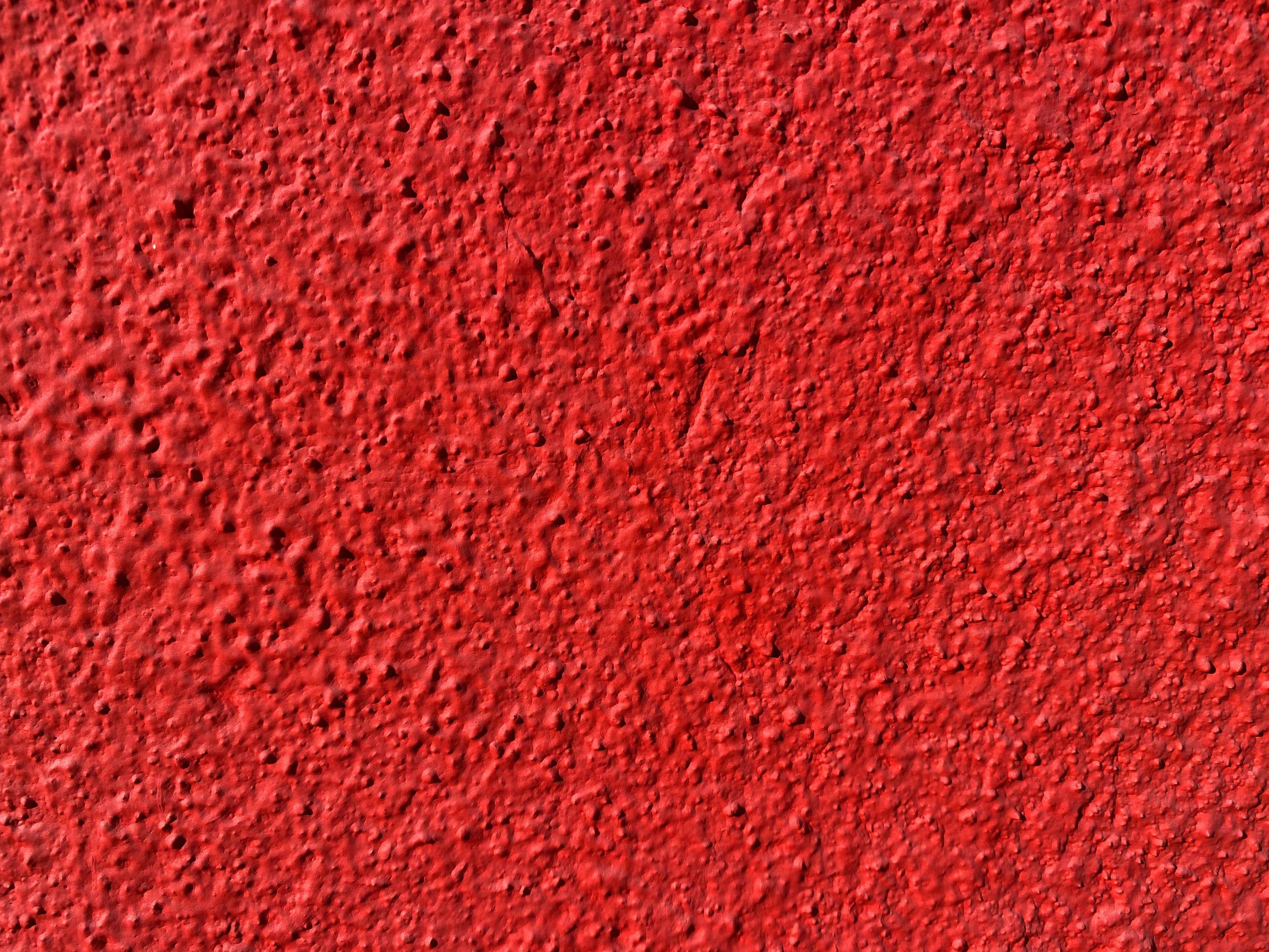 Seamless texture of red cement old wall a rough surface, with space for