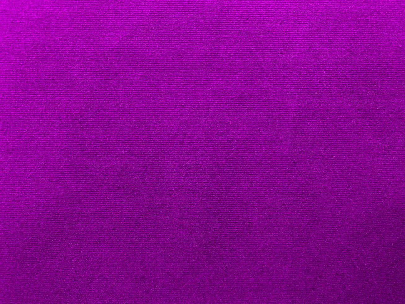Violet velvet fabric texture used as background. Empty purple fabric background of soft and smooth textile material. There is space for text. photo