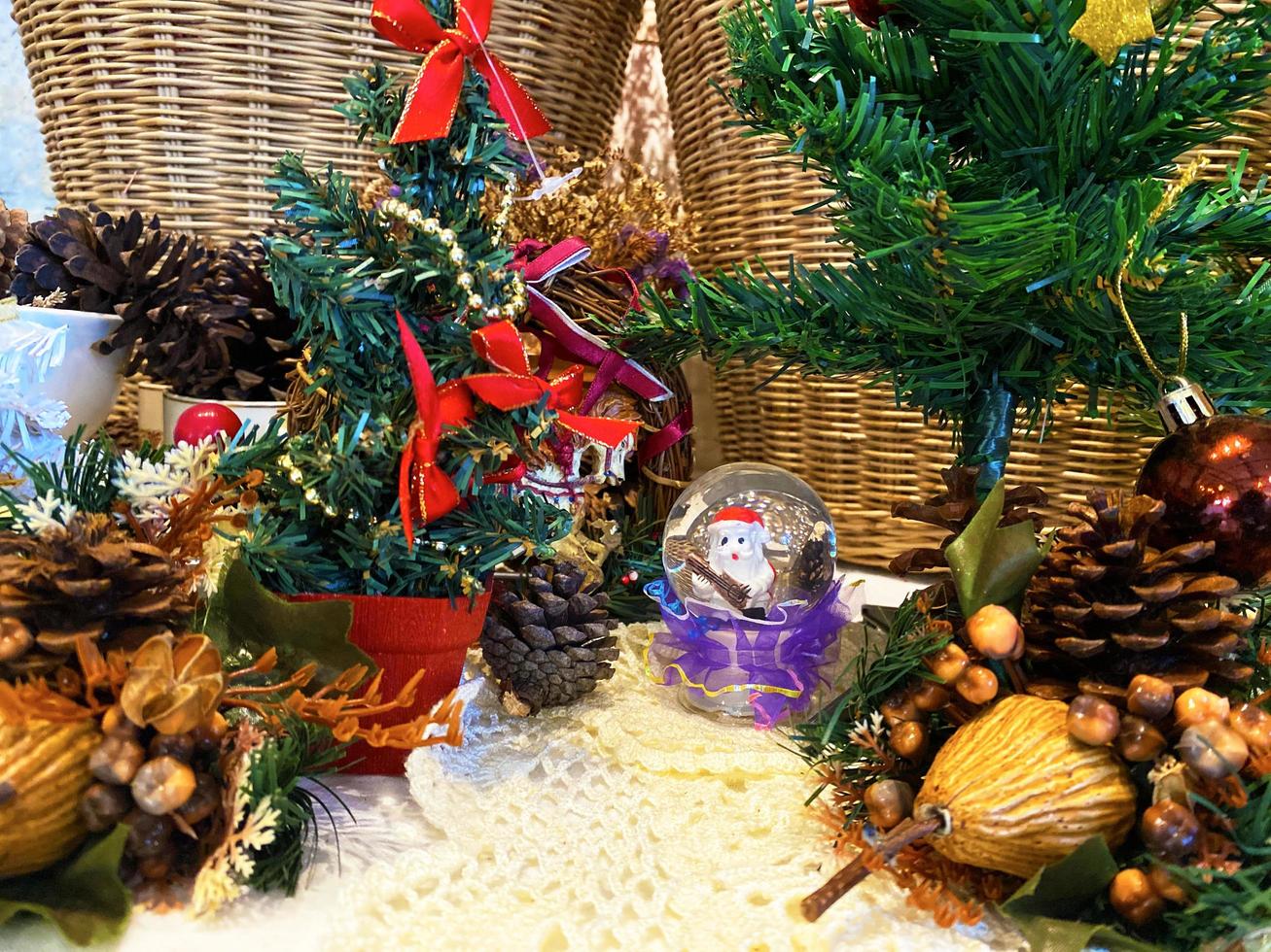 Christmas and New Year background consisting of pine trees, snowmen, gift boxes, used for graphics, designs, with space for text. photo