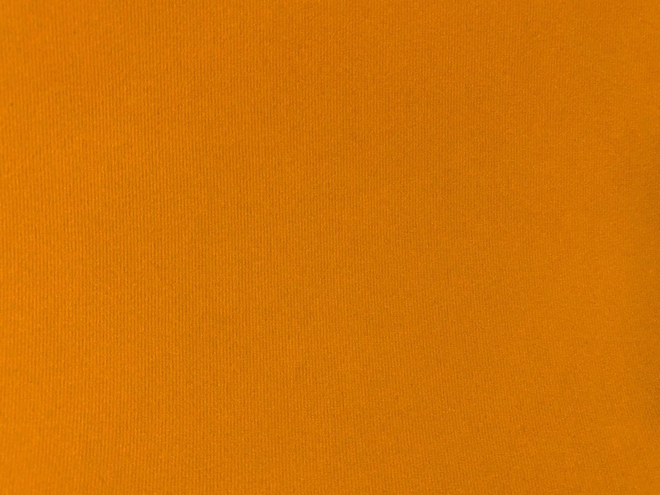 Orange velvet fabric texture used as background. Empty orange fabric background of soft and smooth textile material. There is space for text.. photo