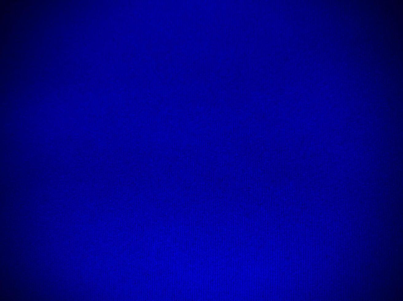 Blue velvet fabric texture used as background. Empty blue fabric background of soft and smooth textile material. There is space for text. photo