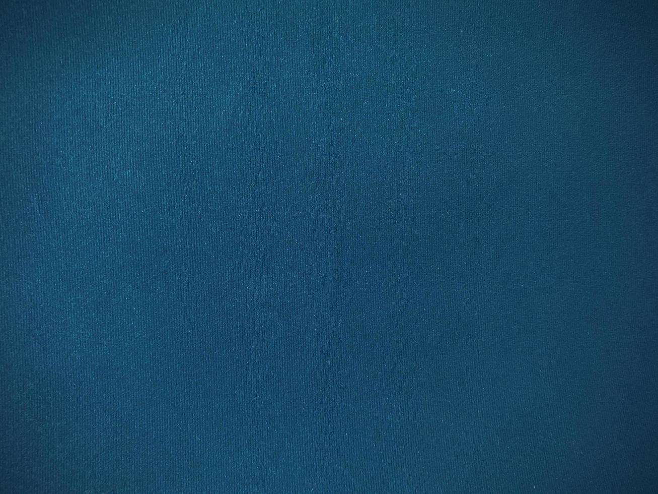 Blue velvet fabric texture used as background. Empty blue fabric background of soft and smooth textile material. There is space for text. photo