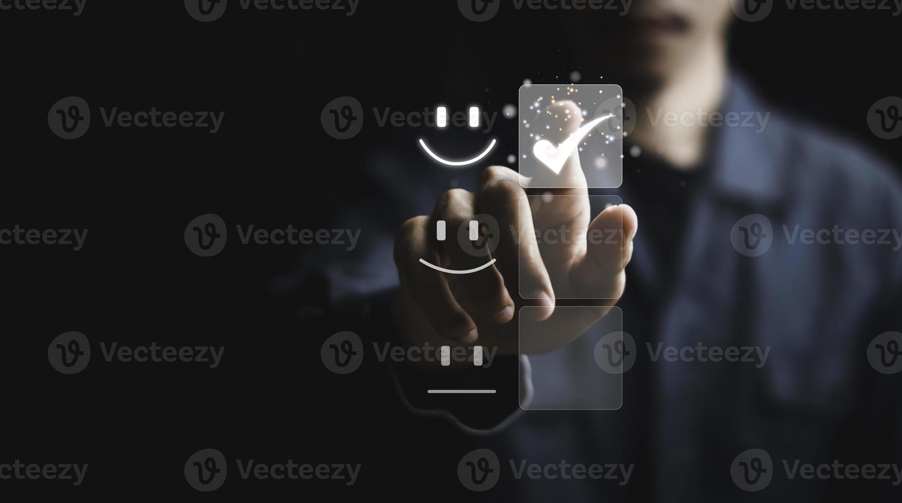 Businessman are touching the virtual screen on the happy Smiley face icon to give satisfaction in service. rating very impressed.digital marketing,Customer service and satisfaction concept photo