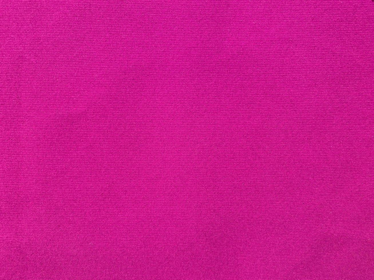 Pink velvet fabric texture used as background. Empty pink fabric background of soft and smooth textile material. There is space for text. photo