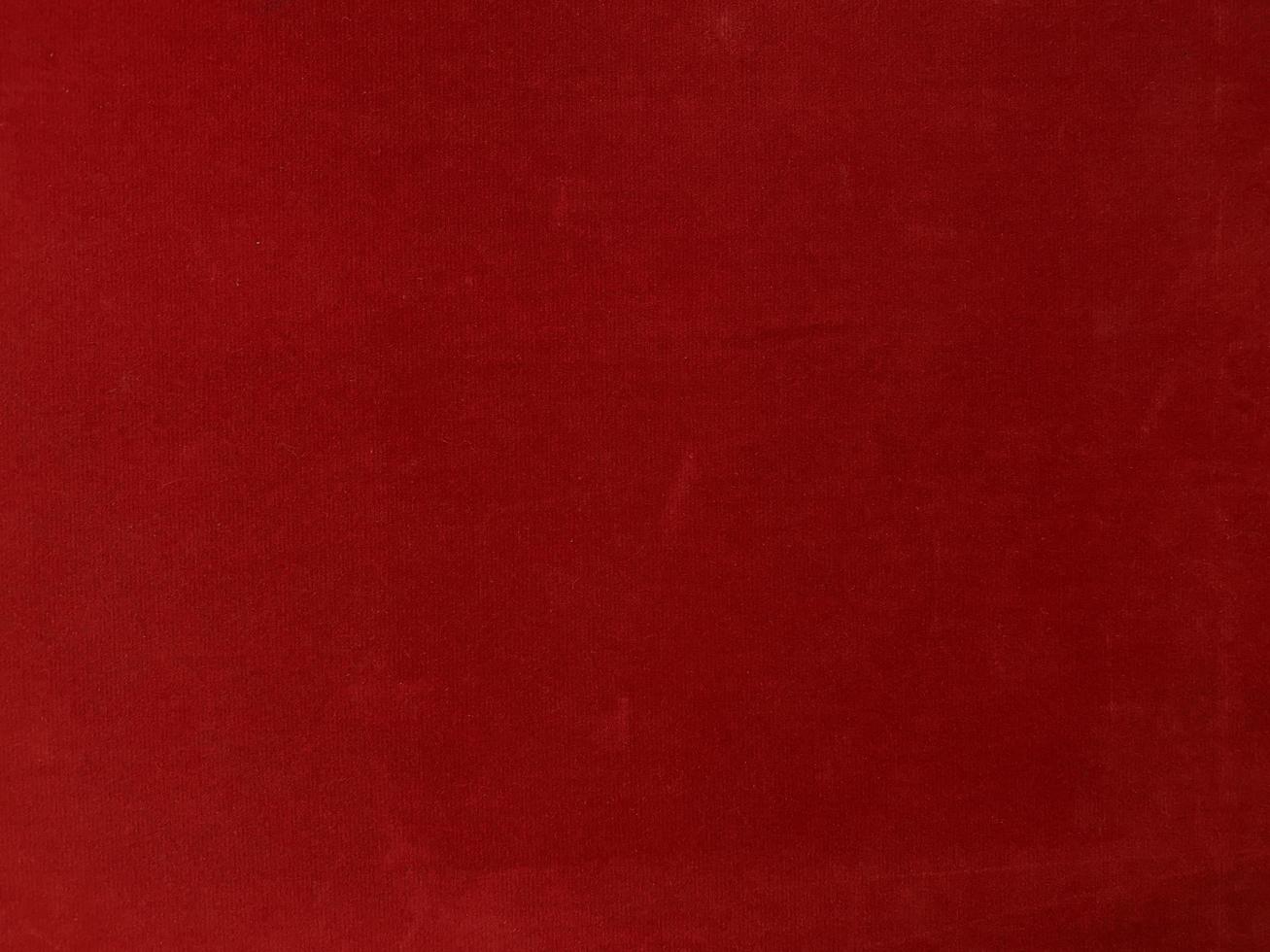 Red velvet fabric texture used as background. Empty Red fabric background of soft and smooth textile material. There is space for text. photo