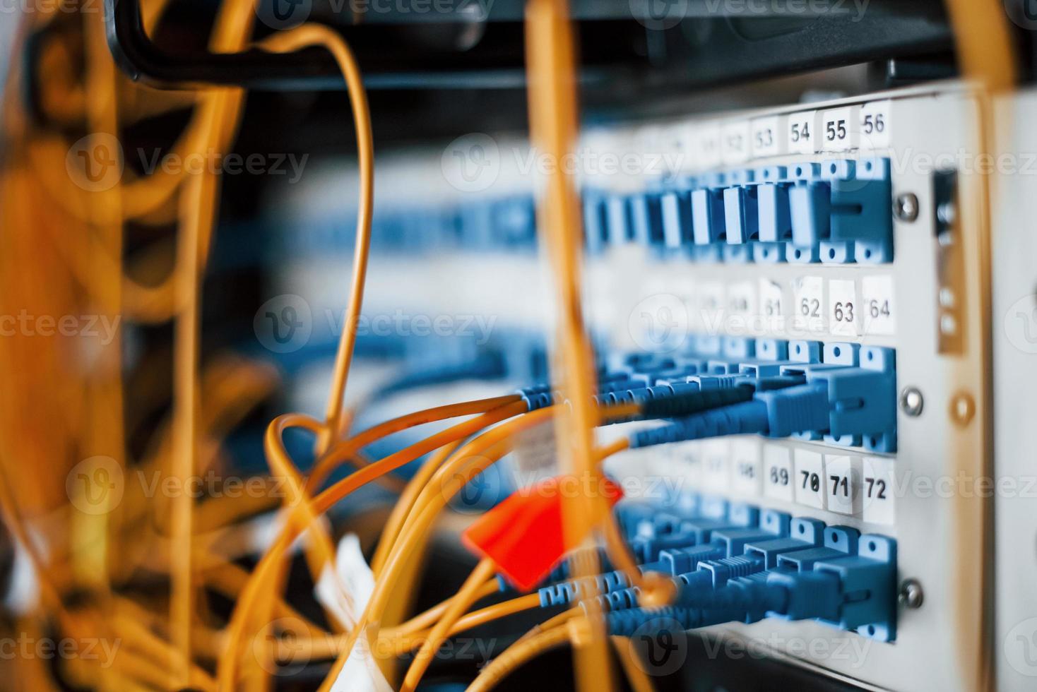 Close up view of internet equipment and cables in the server room photo