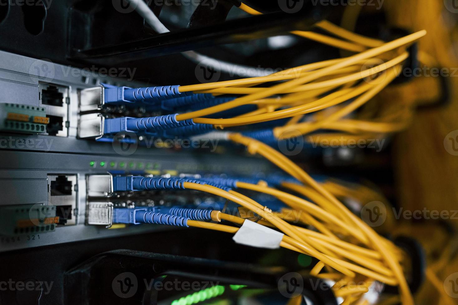 Close up view of internet equipment and cables in the server room photo