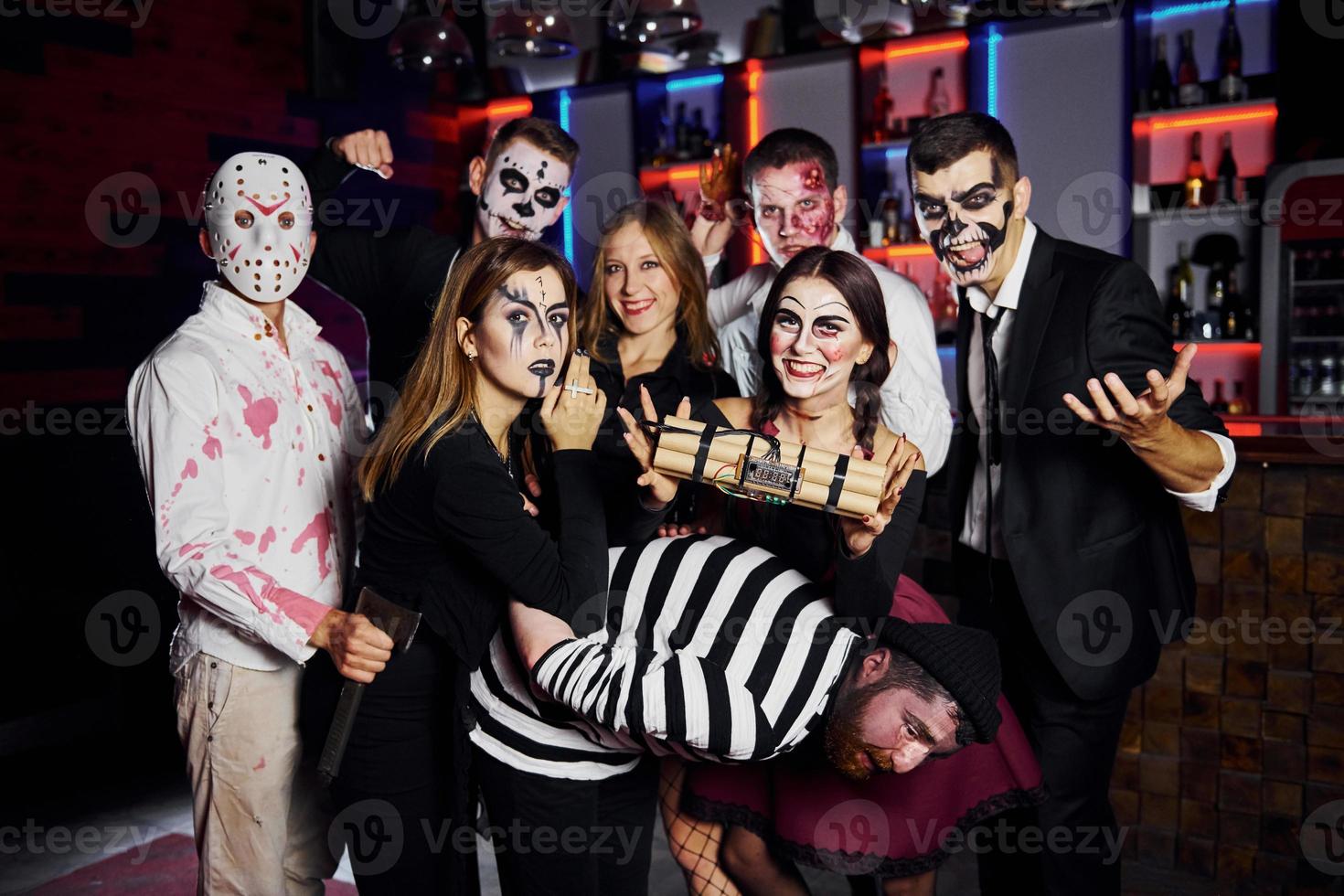 Friends is on the thematic halloween party in scary makeup and costumes photo