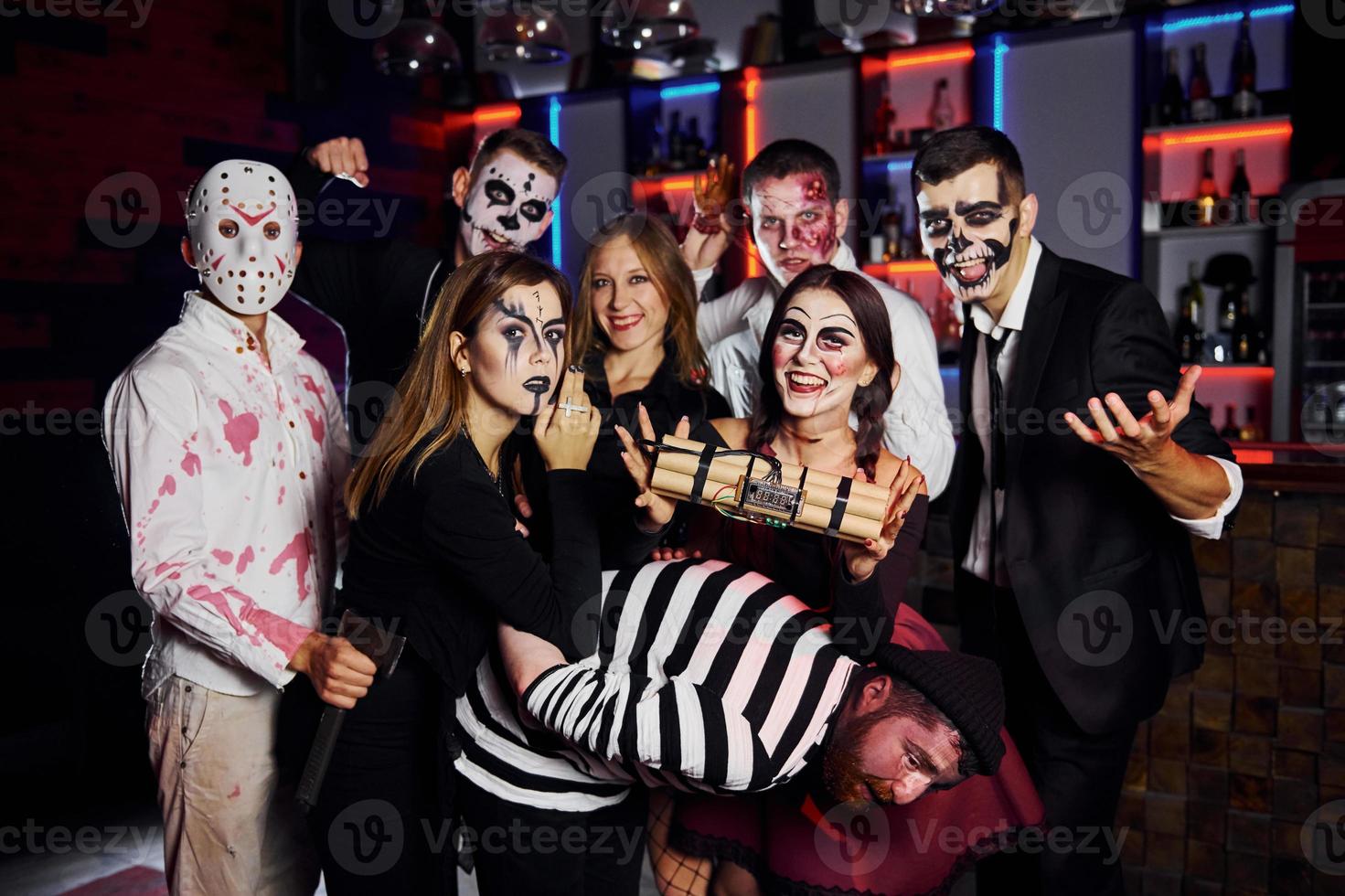 Friends is on the thematic halloween party in scary makeup and costumes photo