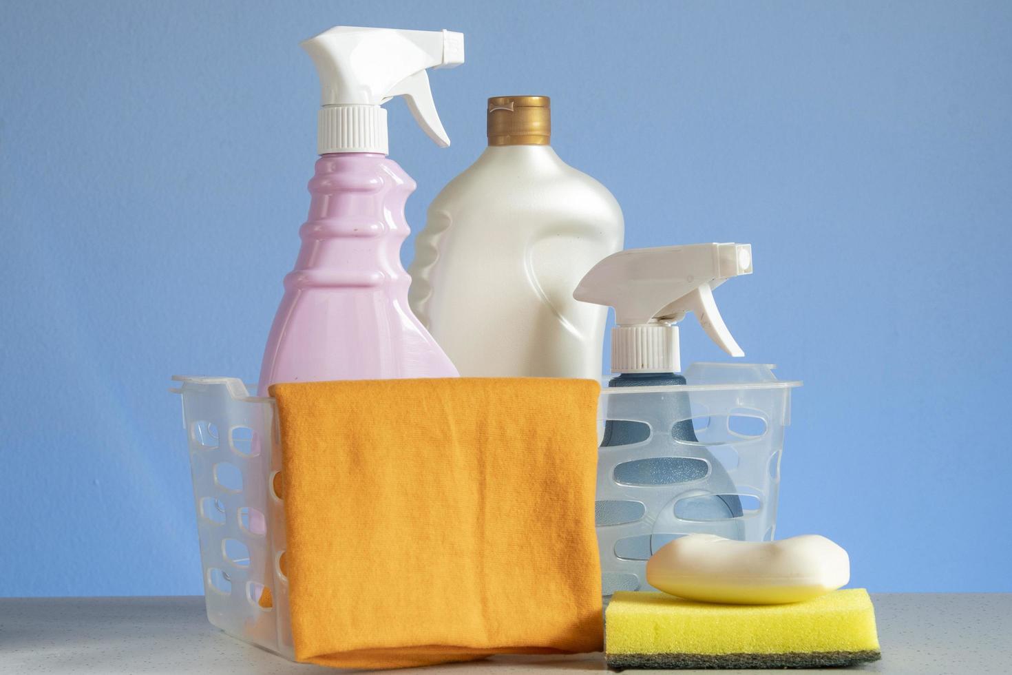 basket with cleaning products for home hygiene use photo