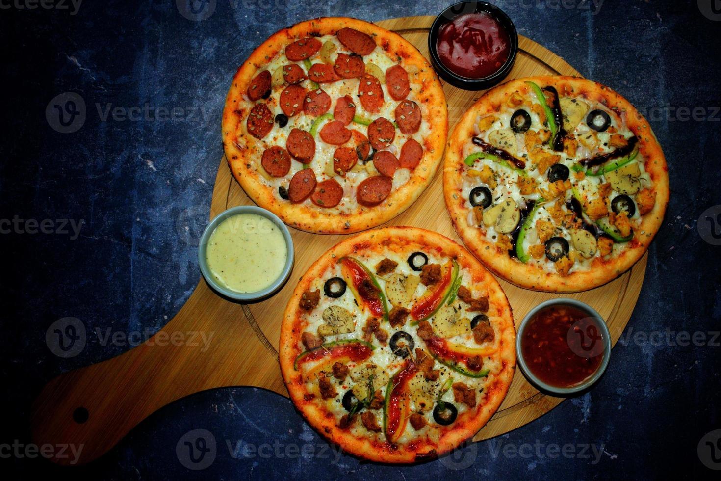 Triple Pizza. Location - Bogura, Bangladesh. Date - 30 November 2022 photo